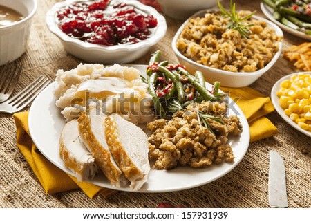 Homemade Turkey Thanksgiving Dinner with Mashed Potatoes, Stuffing, and Corn