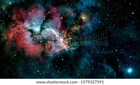 A glorious, rich star forming nebula. Elements of this image furnished by NASA.