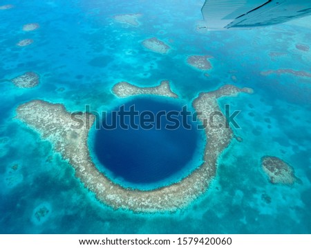  Aerial view of Belize Barrier Reef and Blue Hole                               