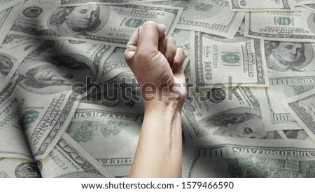Man Hand Isolated on the background of the money