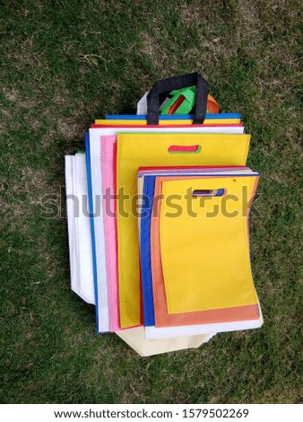 above view of eco bundle bags on grass