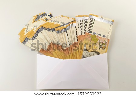 50000 Korean won banknotes in envelope 