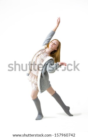 Portrait of young dancer in studio on a white background
