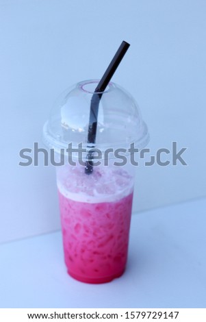 Picture of a sweet pink milk in a glass