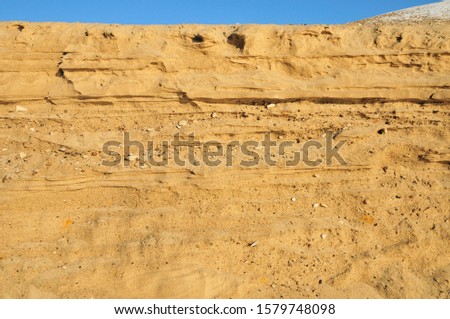 River sand. Sand Spit of the Volga River. The relief is formed by the effects of wind, frost, air, sun and water.