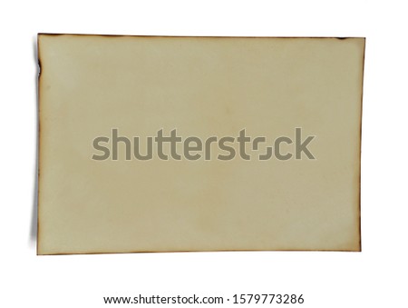 Old photo paper burns at edge of paper isolated on white background.