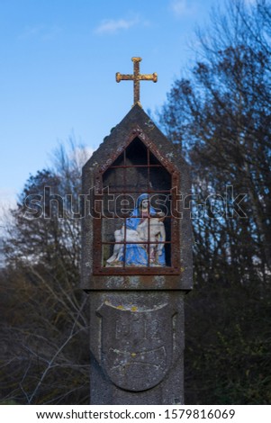 Close-up of a wayside cross on the roadside in the Taunus / Hesse