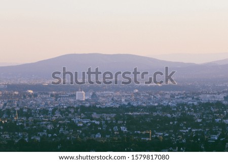 Beautiful sunset with the view of the skyline over the hills around Vienna