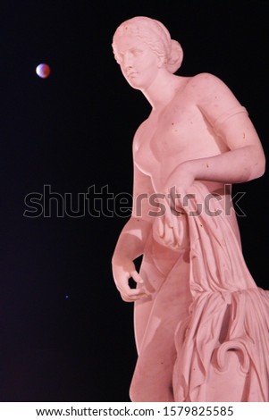 Night illuminated Scenery of Aphrodite / Venus Statue in Chimei museum during Total lunar eclipse is traditional Classical Greek Mythology style. Tainan, Taiwan. Asia. 