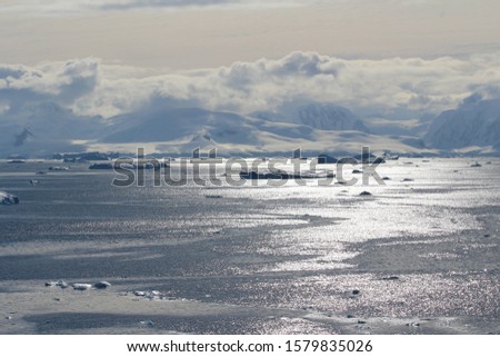 Icebergs and mountains along the Gerlache Strait on the Danco Coast, Antarctica