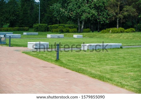 Urban photography, A lawn is an area of soil-covered land planted with grasses and other durable plants,