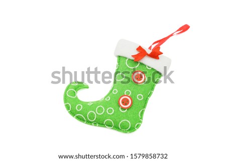 Christmas gift colorful socks, red and green decorations on white background. new year concept.