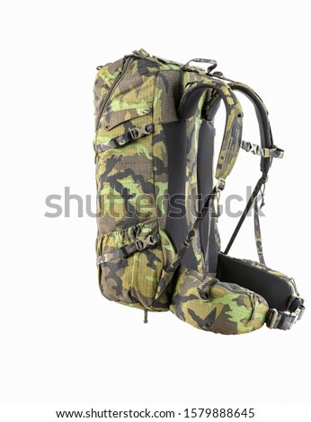 Backpack for hiking and hunting. Camouflage backpack suitable for the forest. Woodland camouflage military backpack. Military backpack isolated on white.