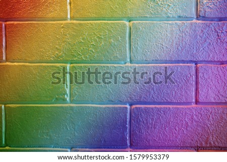 Rainbow colored brick texture closeup horizontal background, detailed coral abstract textured, copy space backdrop.