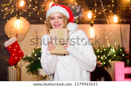 Happy holiday. merry christmas. xmas presents. woman in santa hat. woman hold parcel. write wish list. letter to santa. family greeting with holidays. christmas party invitation. happy new year.