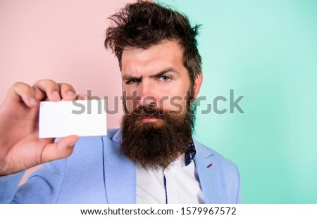 self presentation. serious bearded man business card. copy space. mature businessman. blank piece of paper. barbershop concept. best barber master. barber shop for gentlemen. brutal male beauty.