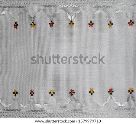 The embroidered ornament on a white background.