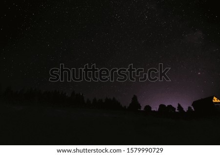 starry sky in the Carpathian mountains village 