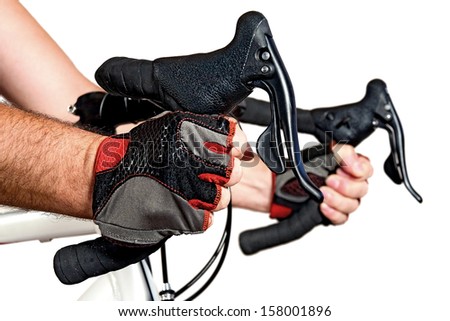Control of the road bicycle. Handlebar road bike close up. Hands in glove drive by bicycle on a white background.