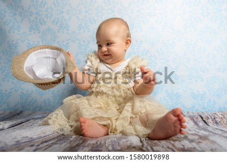 Portrait of adorable baby girl. Childhood. Authentic image