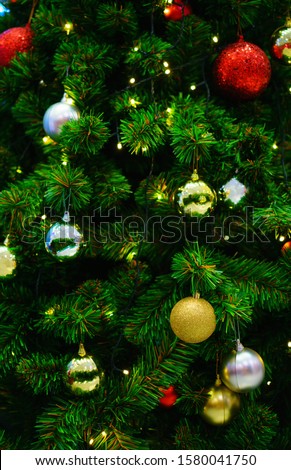 beautifully decorated Christmas tree with bright balls.Christmas background