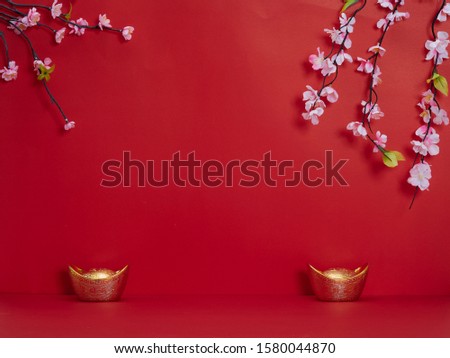Chinese new year 2020. Happy chinese new year or lunar new year. Flowers of good fortune and lump of gold on red background (English translation for foreign text means blessing, luck and wealthy).