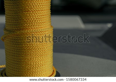 A skein of yellow climbing rope. Yellow strong rope