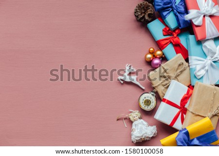 Christmas decoration new year presents holiday pink background