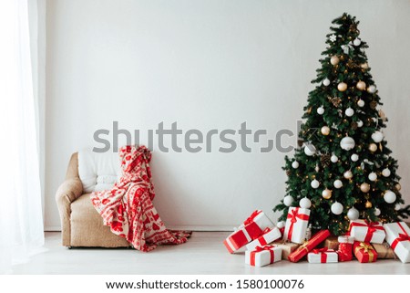 Christmas New Year decoration Christmas tree with gifts of winter December holiday