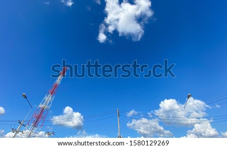 Photos from wide lens beautiful Sky, clouds, electrical lines, power poles and towers.