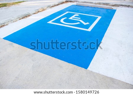 Disabled parking cars for handicapped driver. Wheelchair parking car in the urban city.