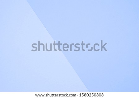 Light paper background in classic blue.
