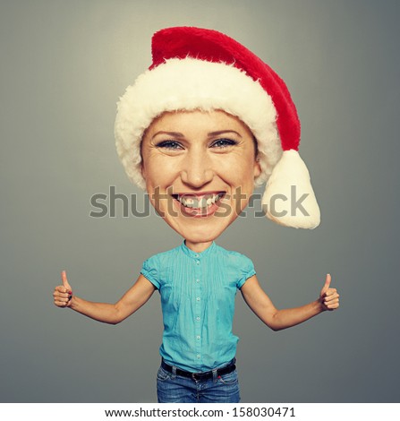 santa happy girl showing thumbs up and smiling