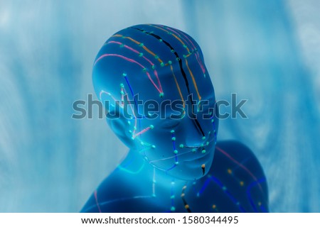 Medical acupuncture model of human Royalty-Free Stock Photo #1580344495