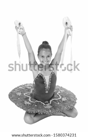 Talented ballet dancer. Kid dress ballet skirt white background isolated. Child practice dancing. Girl dancer gorgeous fancy leotard. Ballet class. School club. Sport and health care. Small ballerina.