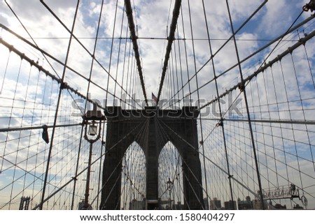 NEW YORK - JUNE 2: Views of the Brooklyn Bridge on a summer day on JUNE 2, 2015. Its a famous and iconic bridge in New York, which passes the east river. 