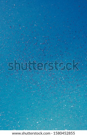 color paper background with tiny sparkles