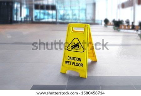 Caution wet slippery floor sign in the building