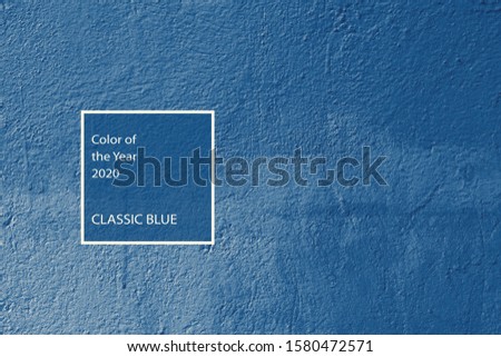 Classic blue color trend concept. Wall texture background