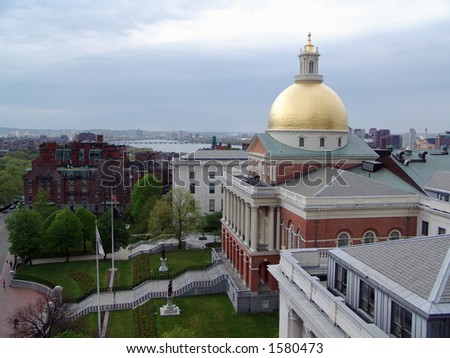  Showing Beacon street and the Massachusetts State House on a cloudy day