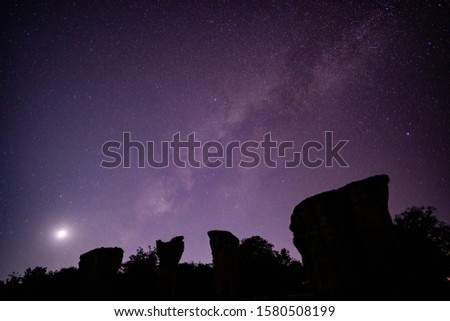 Blurred milky way and star on night sky over Mor hin khao, famous landmarks in Chaiyaphum province, Thailand