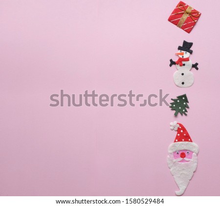 Santa Claus , gift box , snow man on pink background decorations for Christmas new year concept