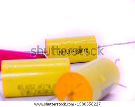 Capacitors on a white background Is a part in electronics