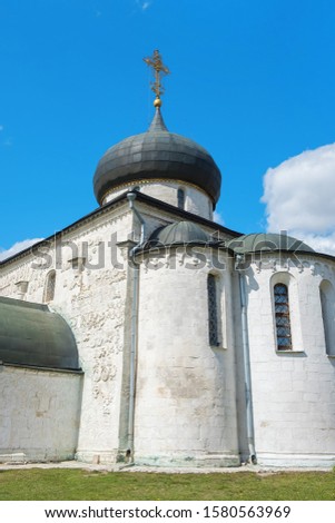 Ancient Russian Orthodox Church of white stone with one dome