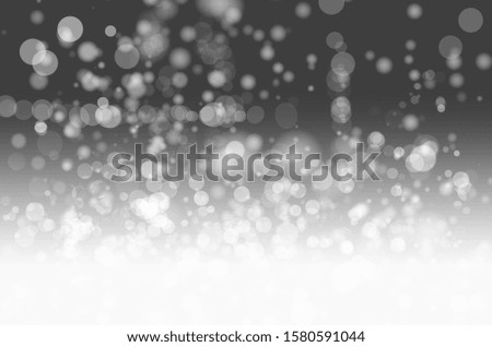 silver and white bokeh lights defocused abstract background