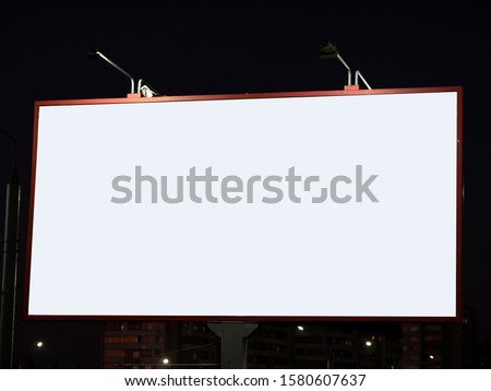 advertising Billboard empty with copyspace for inscription in the night city