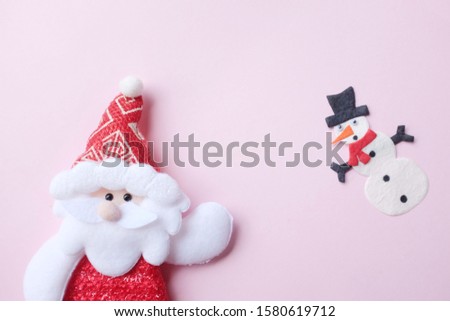 Santa Claus , snow man on pink background decorations for Christmas new year concept