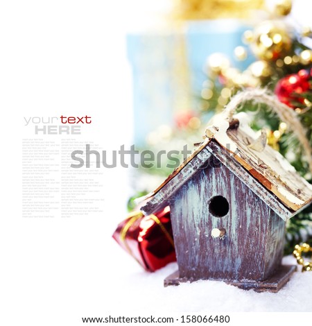 Bright christmas composition with small birdhouse (with easy removable sample text)