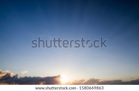 yellowed changed the light and color of the sky during sunset or sunrise, bright sunlight