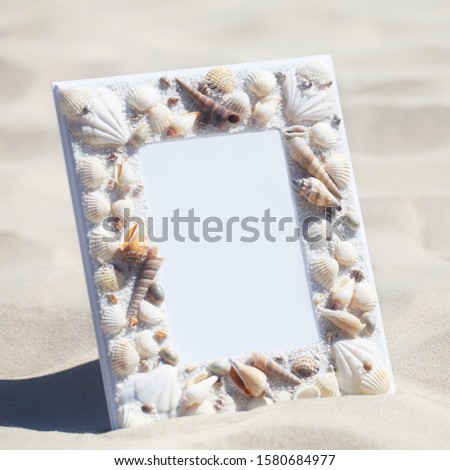 Empty Picture Frame On A Beach